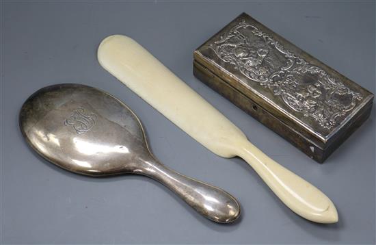 A late Victorian silver mounted box by William Comyns, a silver mounted hand mirror and ivory shoe horn.